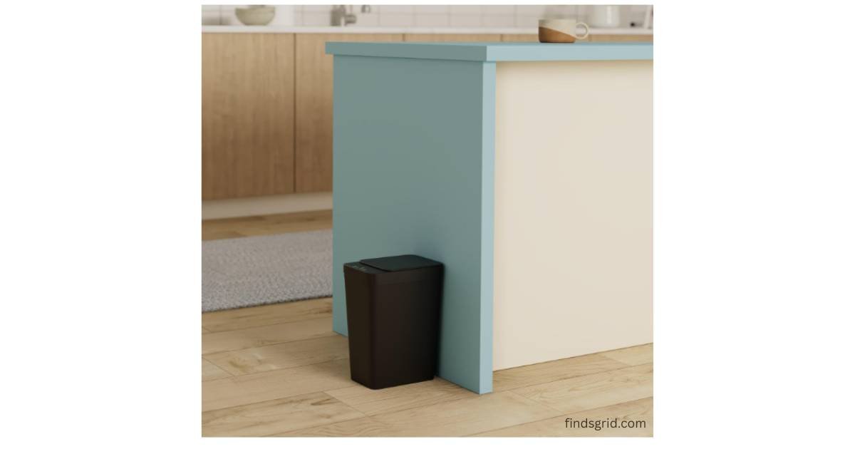 Slim touchless trash can placed in a compact modern home space
