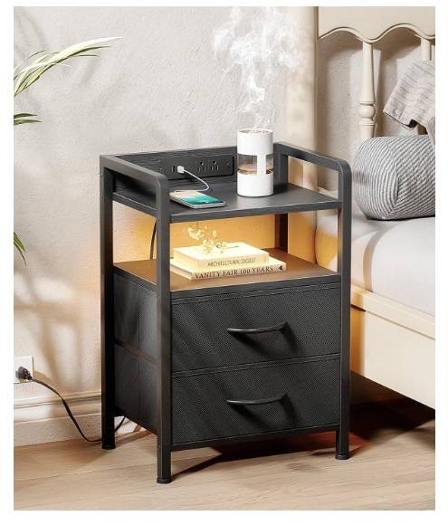 Lazzanto night stand with LED light and charging station in a cozy bedroom setup