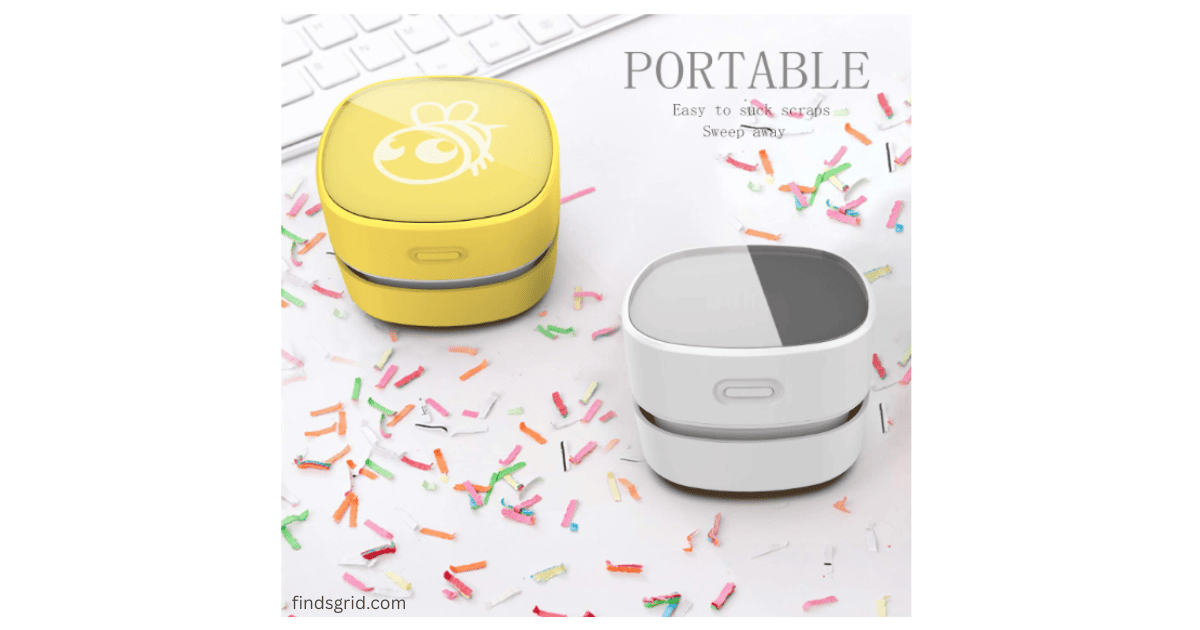 Portable ODISTAR desktop vacuum sweeping away paper scraps