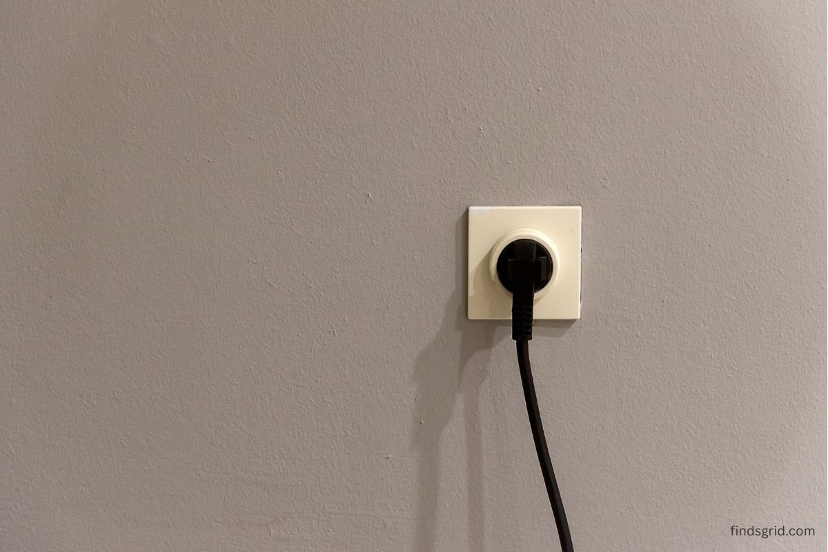 Electrical outlet cover plate on an interior wall