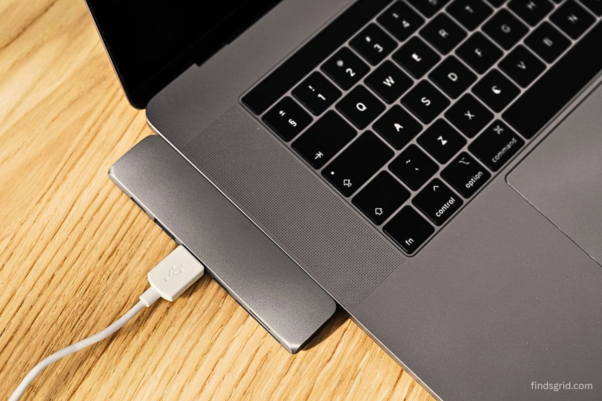 USB-C hub connected to a laptop on a desk