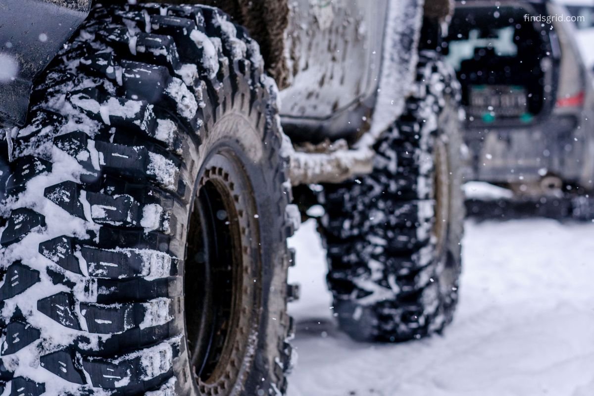 winter tire tread gripping a snowy mountain road
